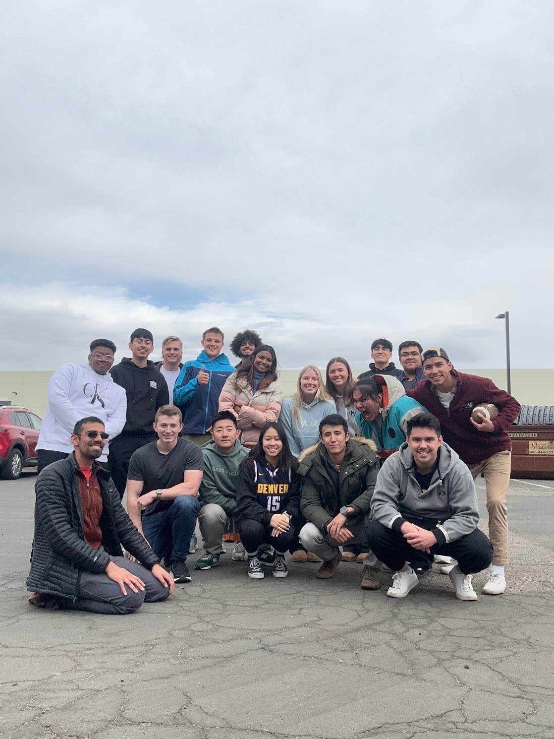 The Kobu volunteer crew together in a parking lot